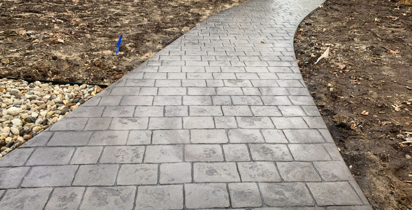 stamped concrete sidewalk path